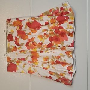 Covington Colorful Pleated Skirt. Floral patterned s with pink, orange, red